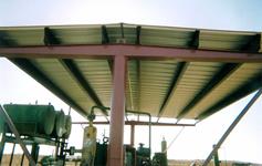 All welded metal compressor shed fabricated from the ground up.